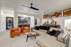 Guest house living room at 6432 E El Sendero Rd featuring a modern layout with a full kitchen, cozy seating, and contemporary decor.
